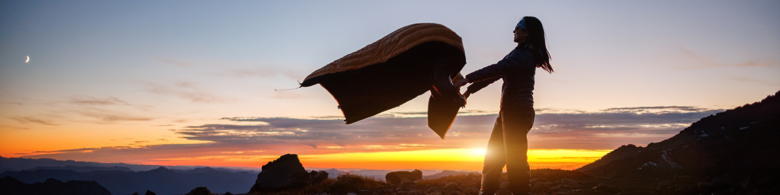 The best ultralight backpacking gear in front of a sunset